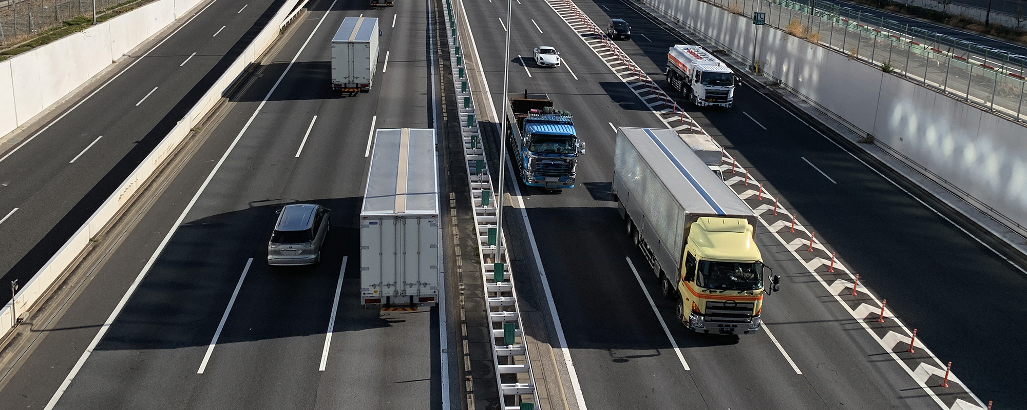 trucks traveling on highway