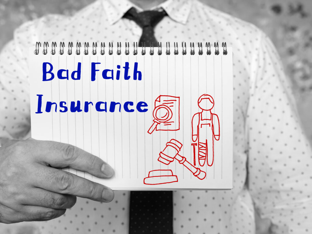 Bad Faith Insurance inscription on the piece of paper.